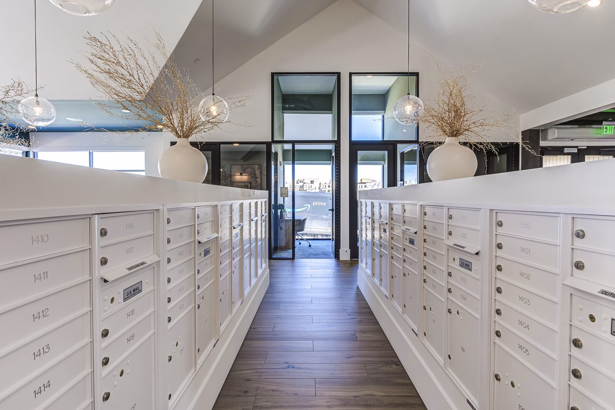 Modern mail room with secure package lockers at Novel Daybreak Apartments