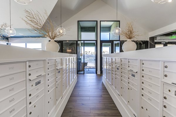 Modern mail room with secure package lockers at Novel Daybreak Apartments