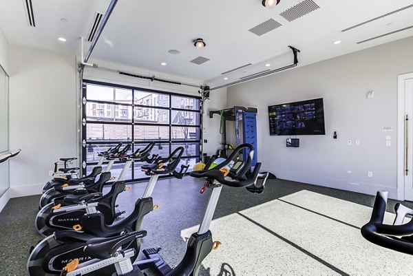 Modern fitness center with state-of-the-art equipment at Novel Daybreak Apartments