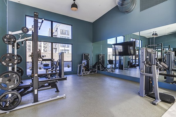 Fitness center with modern equipment at Novel Daybreak Apartments