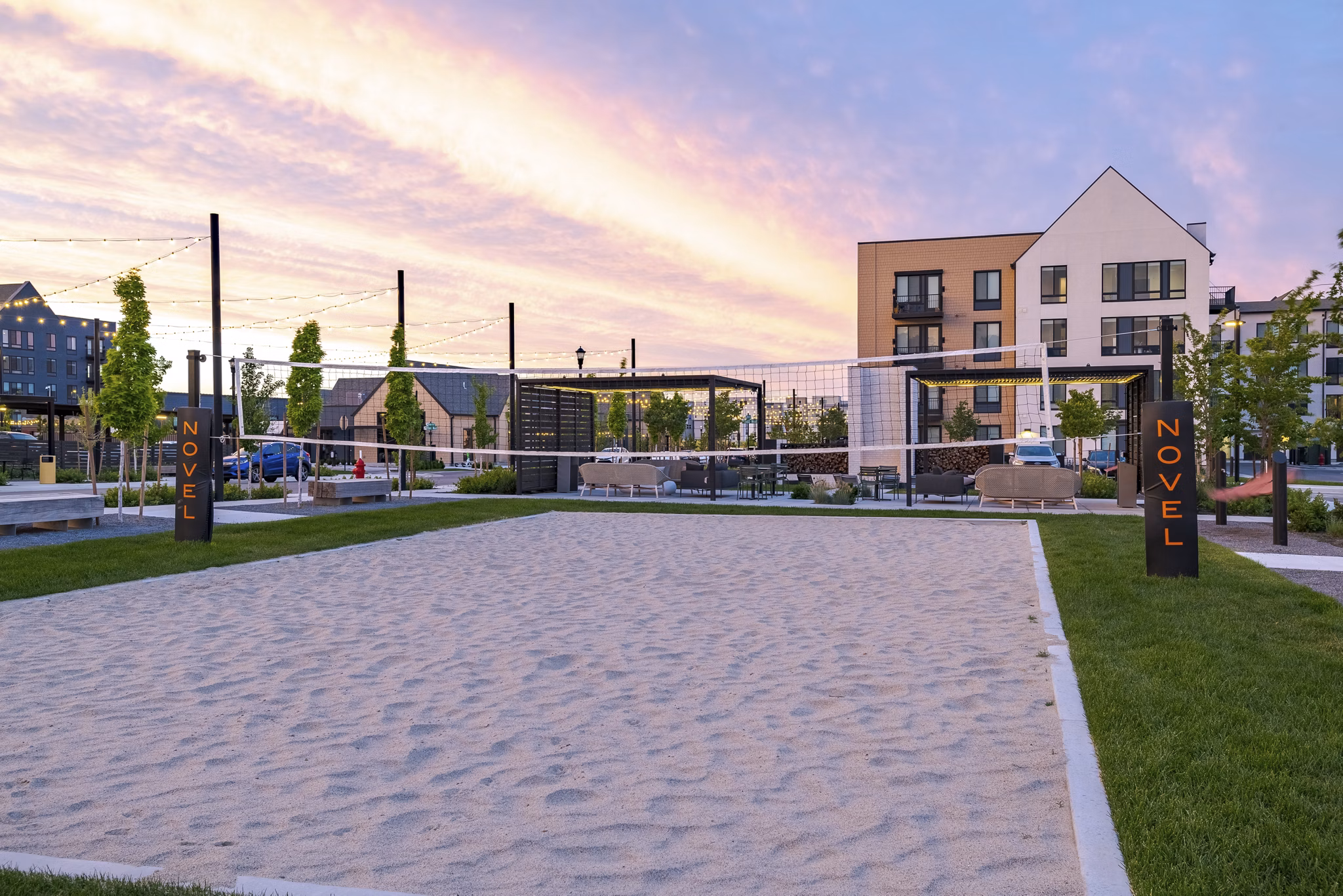 Outdoor sport court at Novel Daybreak Apartments offering space for basketball and pickleball games