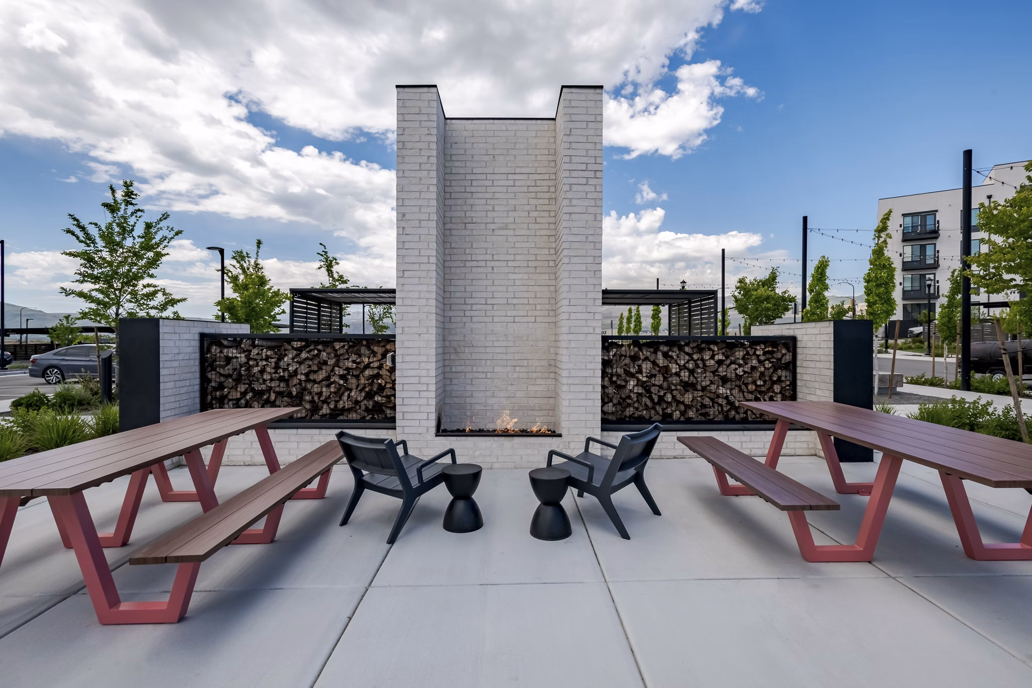 Outdoor fire pit lounge at Novel Daybreak Apartments enhancing community gathering spaces