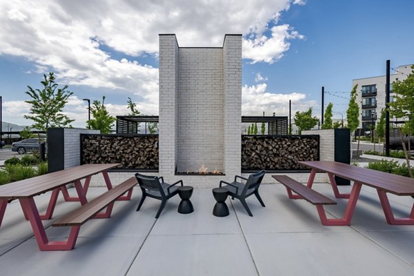 Outdoor fire pit lounge at Novel Daybreak Apartments enhancing community gathering spaces