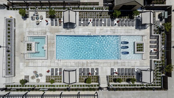 Novel Daybreak Apartments: Scenic view of luxury apartments with lush landscaping in South Charlotte