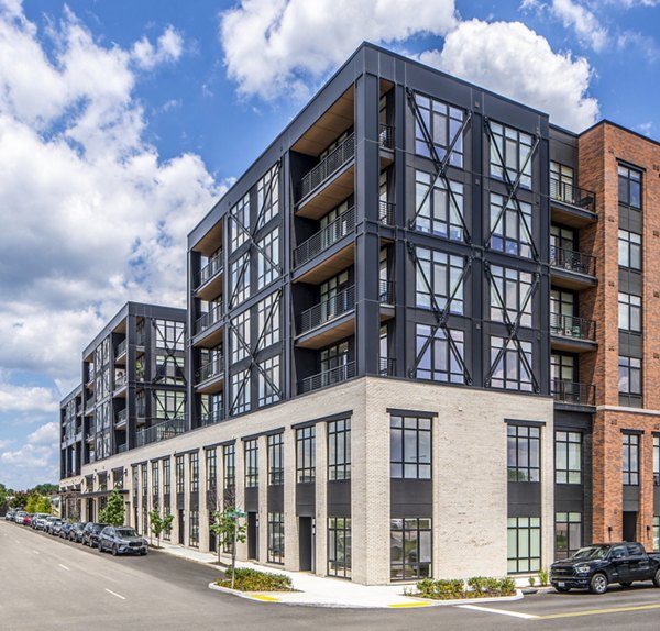 Otis Apartments: Sleek modern high-rise building in vibrant downtown location