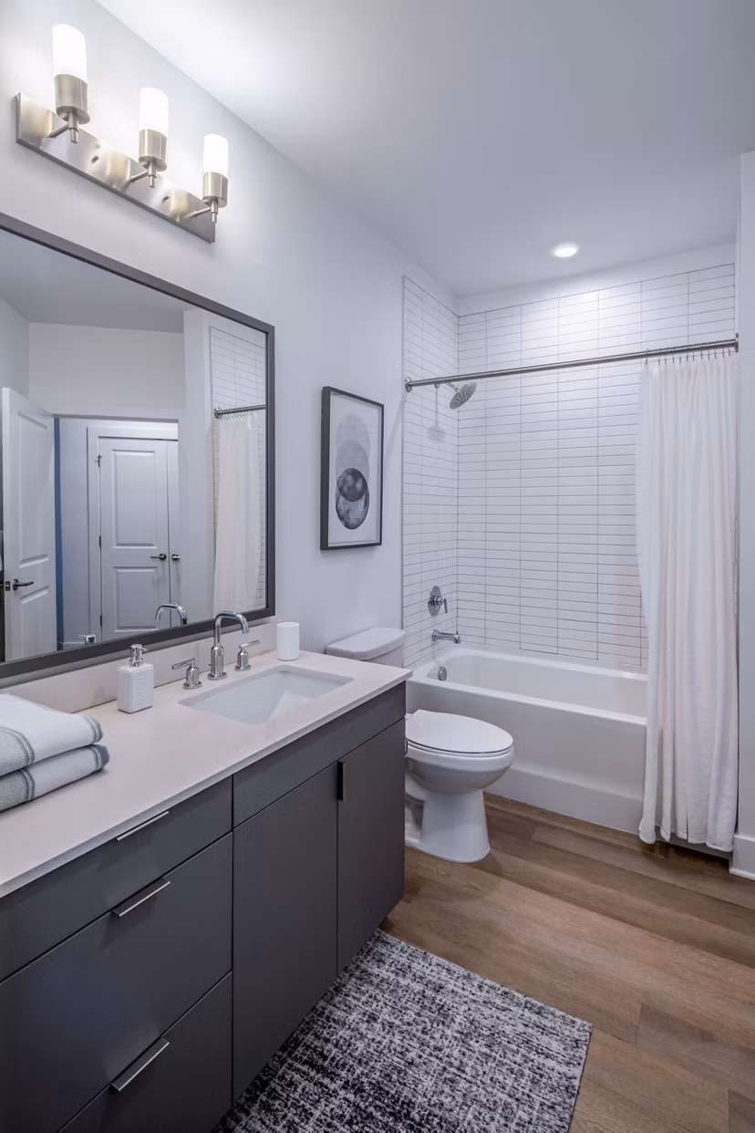 Modern bathroom featuring sleek fixtures at Otis Apartments