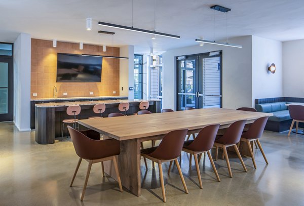 Clubhouse meeting facility with modern design at Otis Apartments, a luxury community offering premium amenities for residents