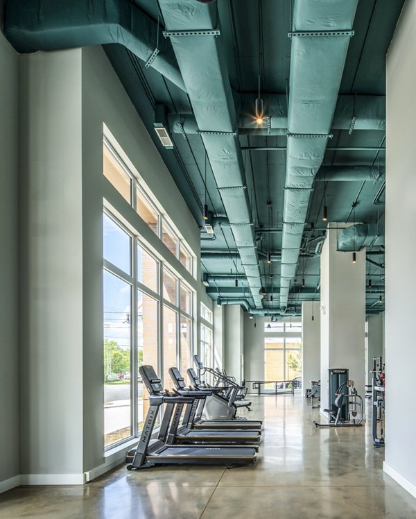 State-of-the-art fitness center with modern equipment at Otis Apartments