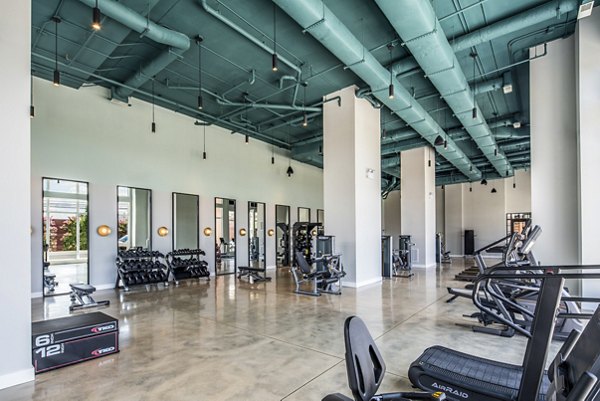 State-of-the-art fitness center featuring modern equipment at Otis Apartments, luxury living near downtown
