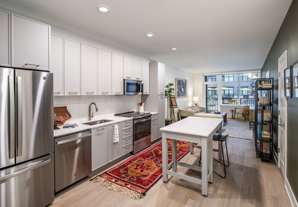 Spacious kitchen with modern appliances in Otis Apartments