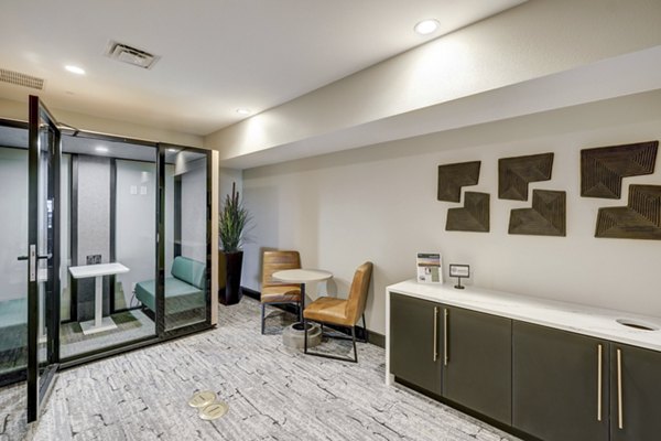 Clubhouse business center with modern workstations at Heights at Interlocken Apartments
