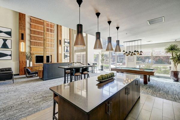 Elegant clubhouse with modern furnishings at Heights at Interlocken Apartments, offering luxury living and community spaces