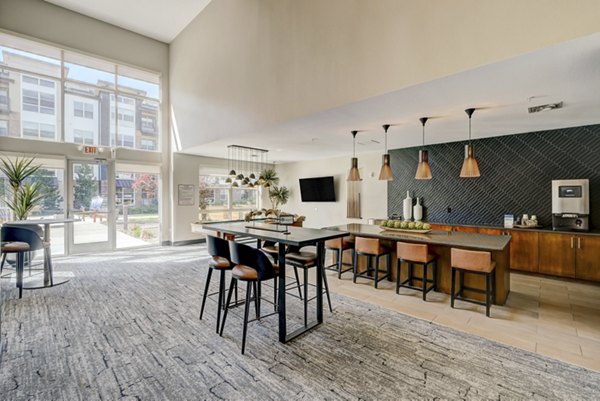 Heights at Interlocken Apartments: Modern clubhouse with stylish furnishings and ample natural light, ideal for luxury living