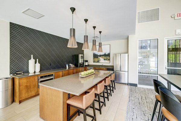 Modern clubhouse featuring stylish seating and entertainment options at Heights at Interlocken Apartments
