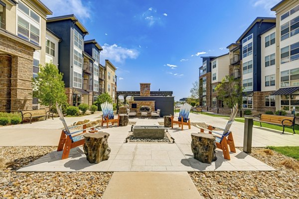 Heights at Interlocken Apartments: Scenic patio with comfortable seating and mountain views