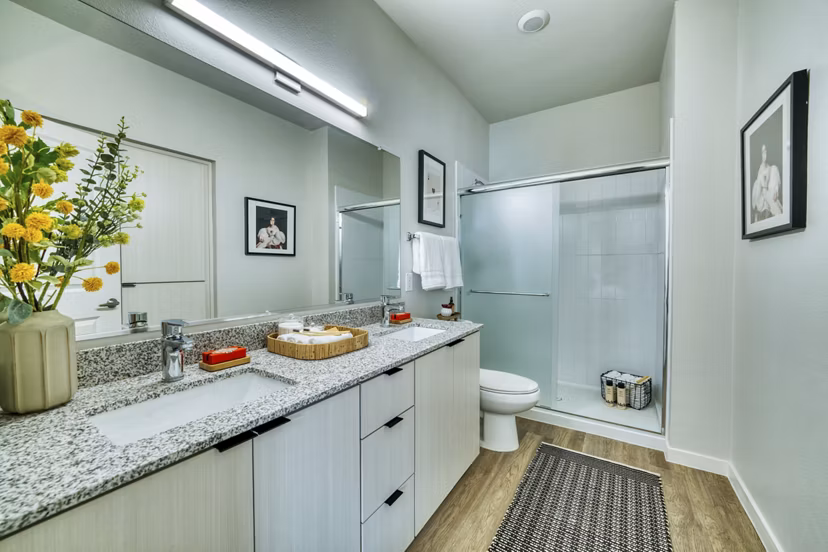 Modern bathroom with sleek fixtures in The Riley Apartments, offering luxury living near downtown Ideal for refined apartment seekers