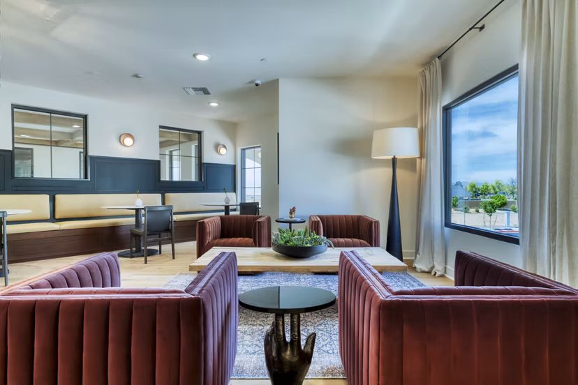 Clubhouse featuring modern amenities at The Riley Apartments in Greystar's luxury apartment community