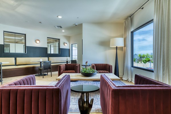 Clubhouse featuring modern amenities at The Riley Apartments in Greystar's luxury apartment community