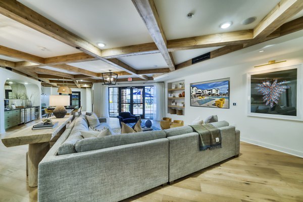 Elegant clubhouse with modern decor at The Riley Apartments, luxury community in a vibrant neighborhood