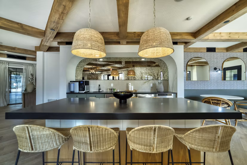 Clubhouse featuring modern furnishings and open floor plan at The Riley Apartments