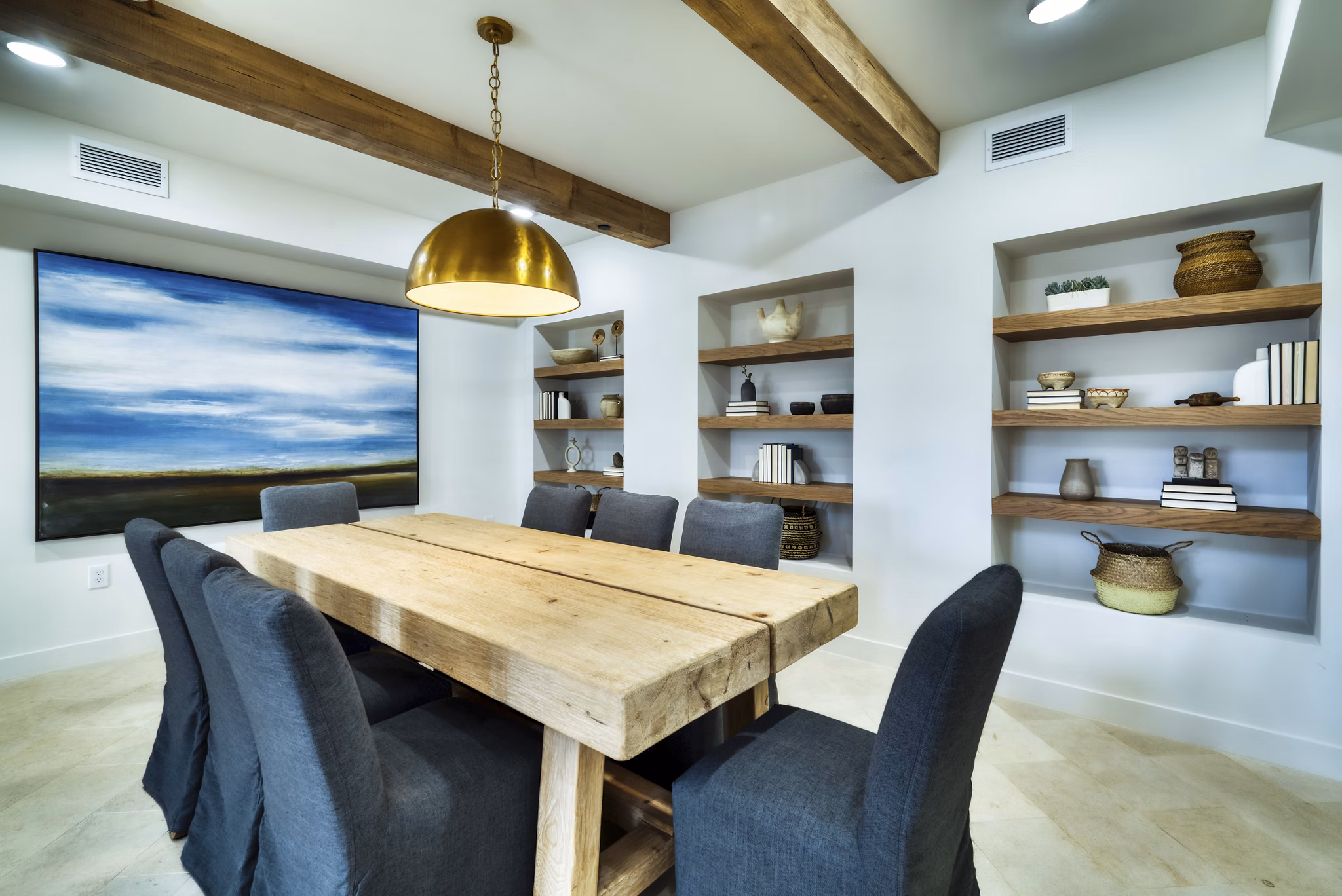 Meeting room equipped with modern conference tables and AV system at The Riley Apartments, ideal for business gatherings and events