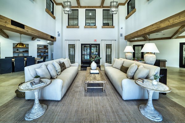 Riley Apartments: Modern clubhouse with stylish decor and comfortable seating areas in San Francisco
