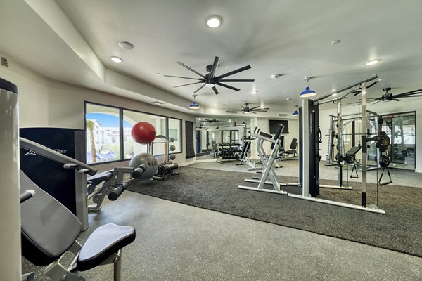 Modern fitness center with state-of-the-art equipment at The Riley Apartments