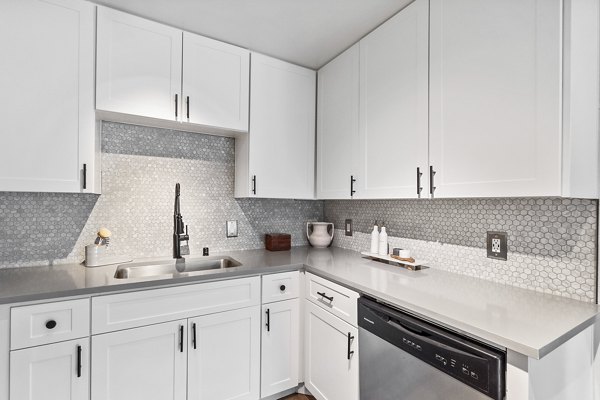 Modern kitchen with stainless steel appliances at Madera Ridge Apartments Perfect for gourmet cooking in luxury living spaces