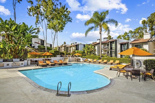Resort-style pool with cabanas at Madera Ridge Apartments, a luxury Greystar community