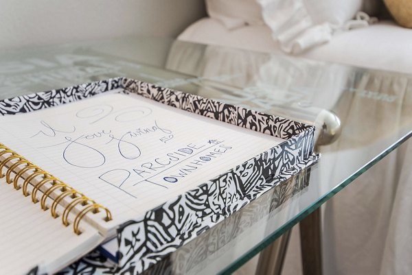 Cozy bedroom with modern decor in Parcside Townhomes Apartments