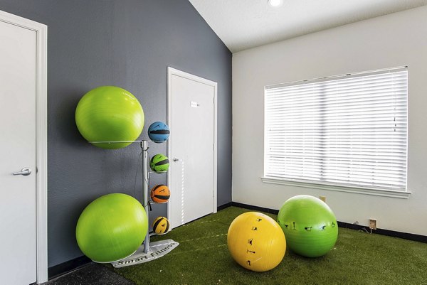 State-of-the-art fitness center with modern equipment at Parcside Townhomes Apartments