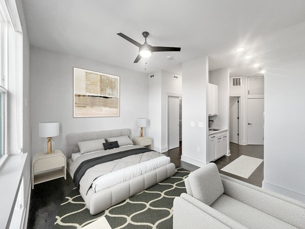 Modern kitchen with stainless steel appliances in San Fernando Building Apartments