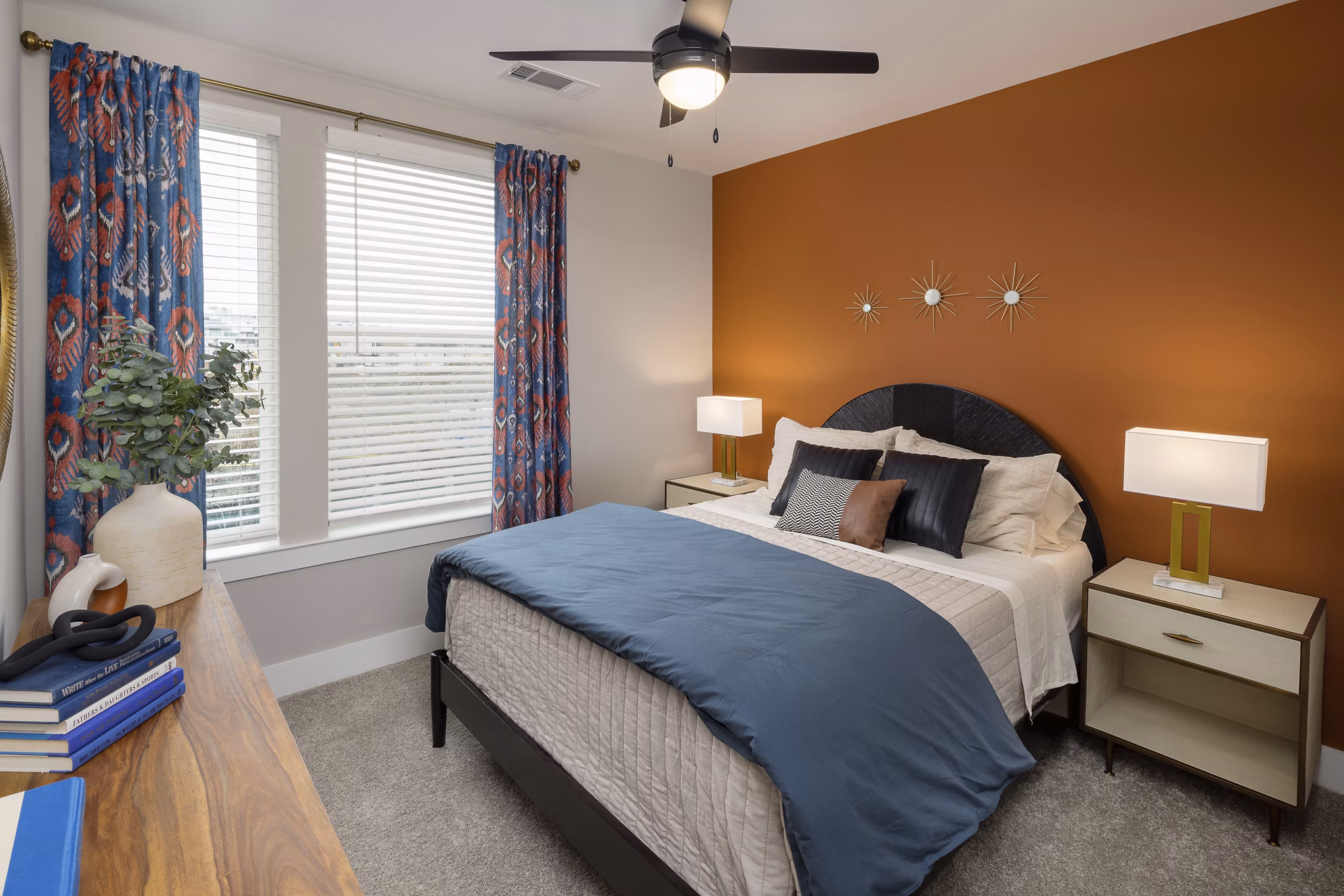 Spacious bedroom with large windows at Broadstone Centennial Apartments