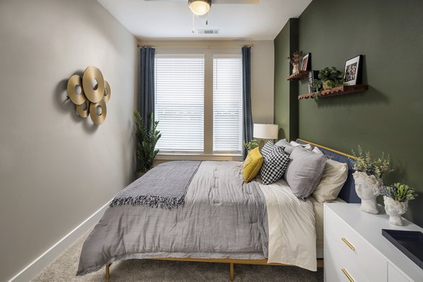 Boutique bedroom with elegant decor at Broadstone Centennial Apartments, featuring luxury finishes and modern design elements