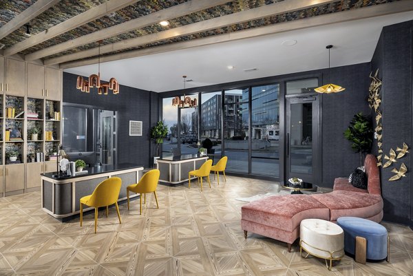 Elegant clubhouse with cozy seating and modern design at Broadstone Centennial Apartments