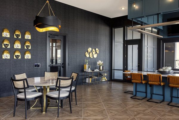Clubhouse with modern design at Broadstone Centennial Apartments offering luxurious spaces for relaxation and socializing