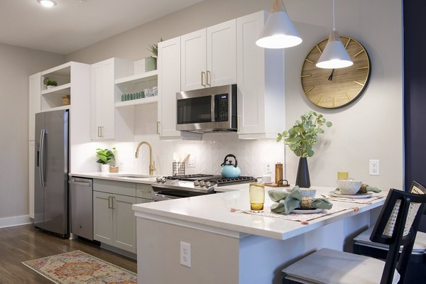 Modern kitchen with stainless steel appliances at Broadstone Centennial Apartments, ideal for luxury living