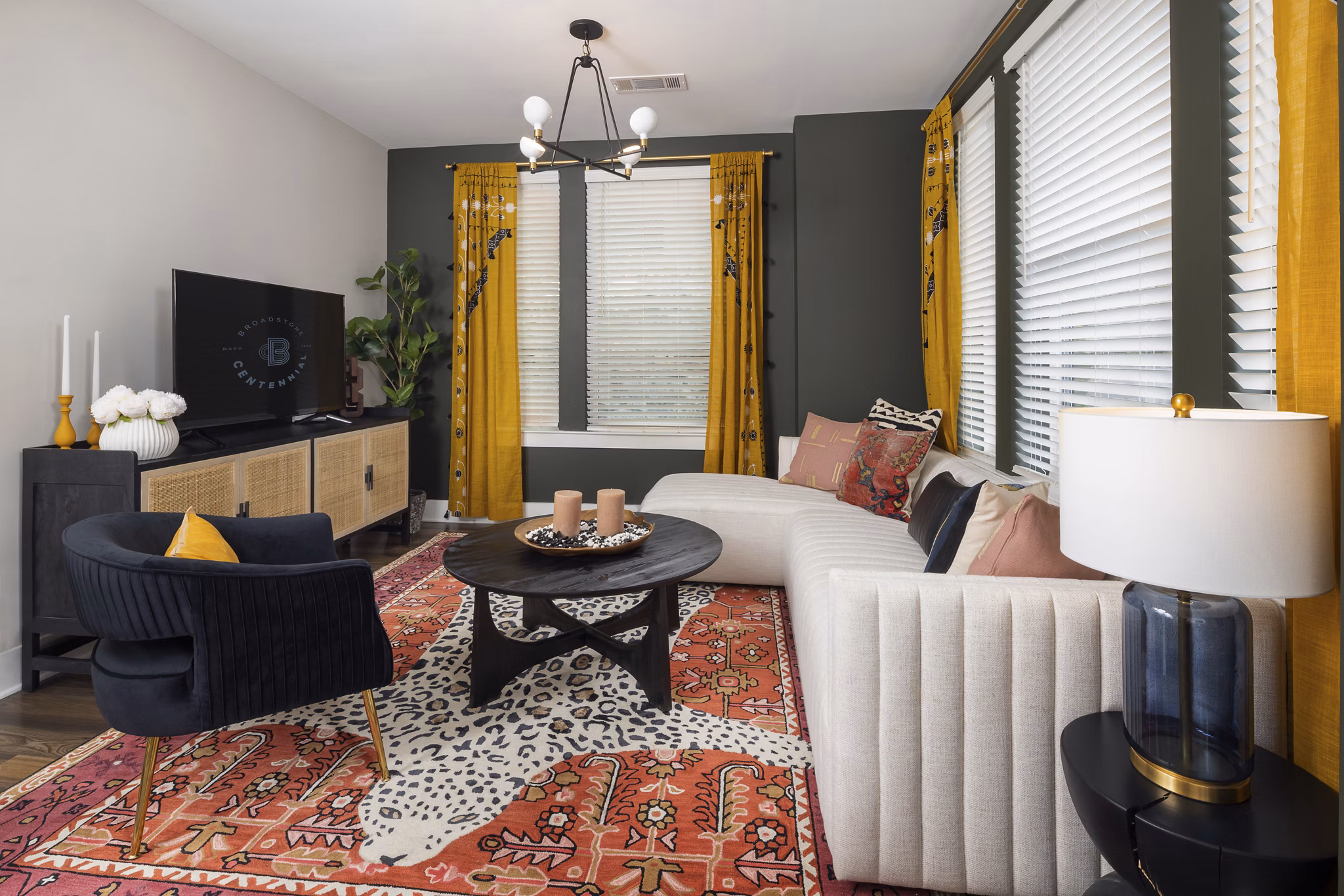 Spacious living room with contemporary decor in Broadstone Centennial Apartments