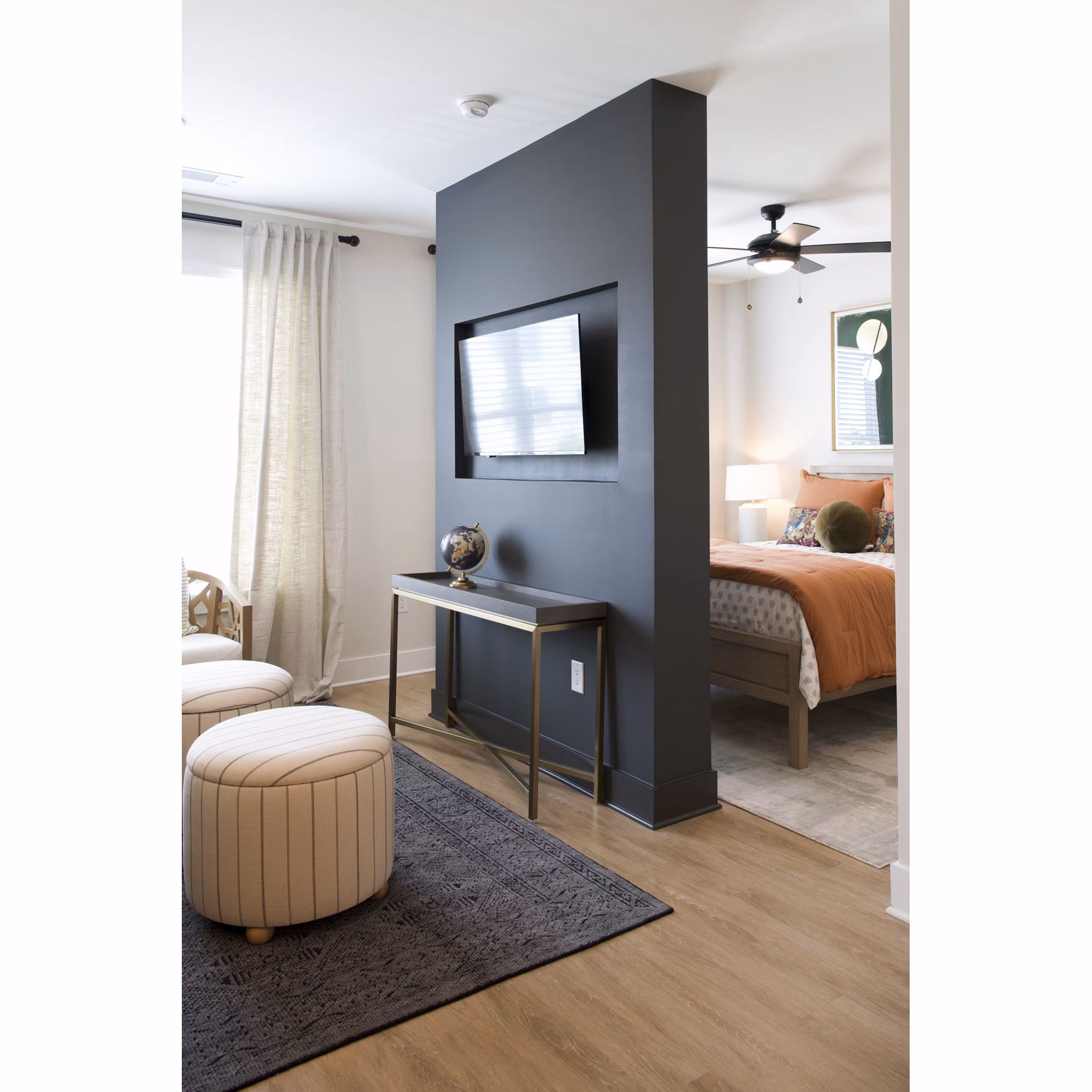 Cozy bedroom with modern decor in Novel University Place Apartments