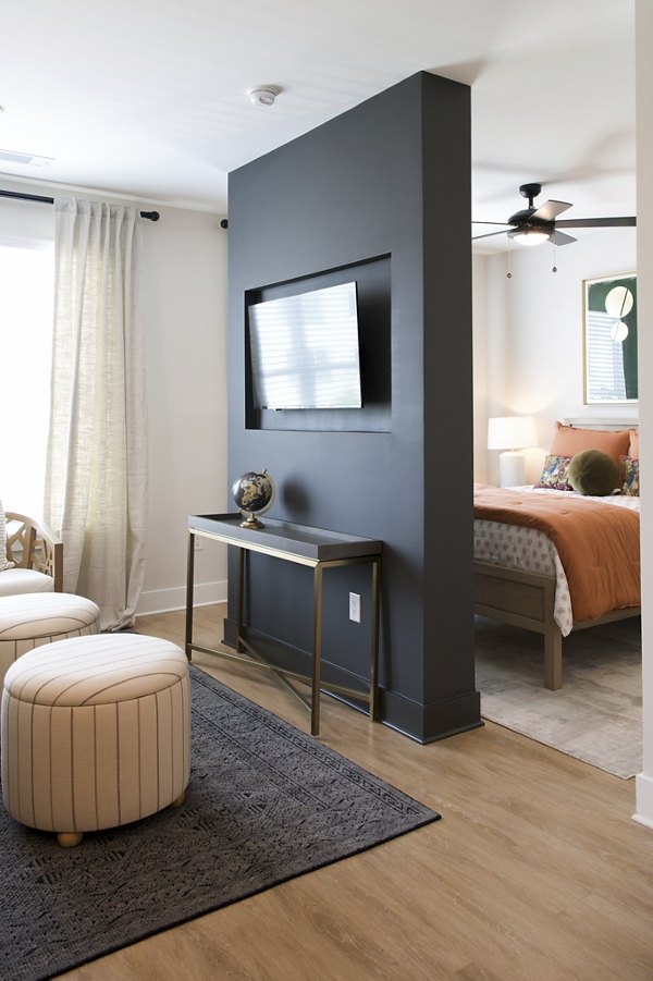 Cozy bedroom with modern decor in Novel University Place Apartments