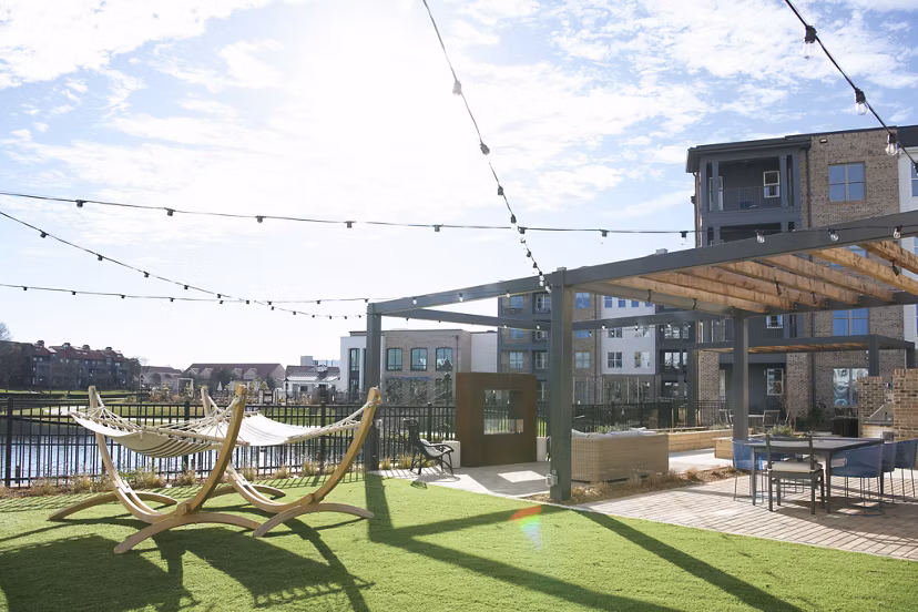 Courtyard with lush greenery at Novel University Place Apartments
