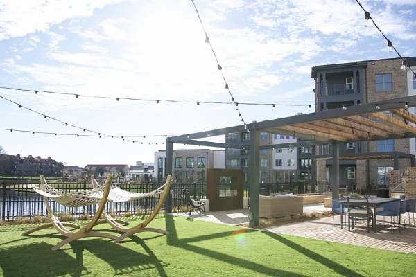 Courtyard with lush greenery at Novel University Place Apartments