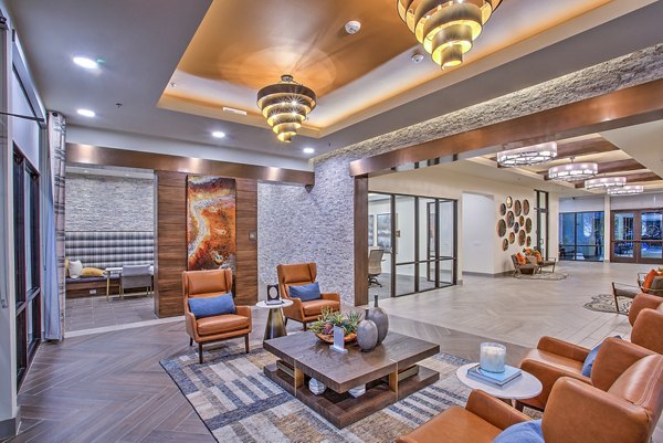Chic clubhouse with modern decor at McKinney Terrace Apartments, offering luxury amenities and social spaces for residents