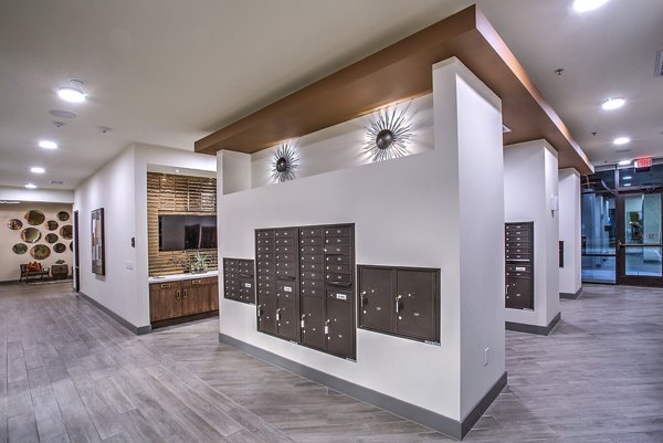 Mail room with organized mailboxes at McKinney Terrace Apartments