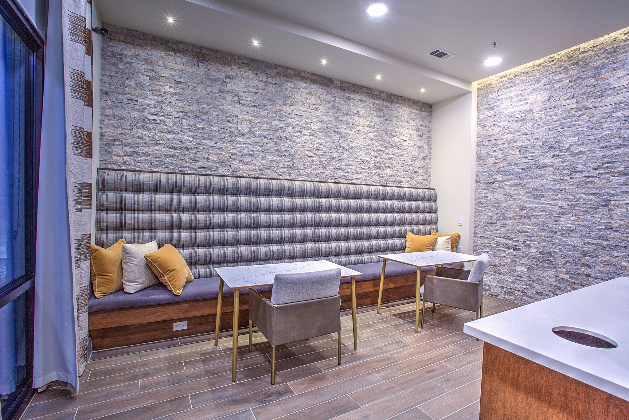 Modern clubhouse with elegant seating and entertainment options at McKinney Terrace Apartments