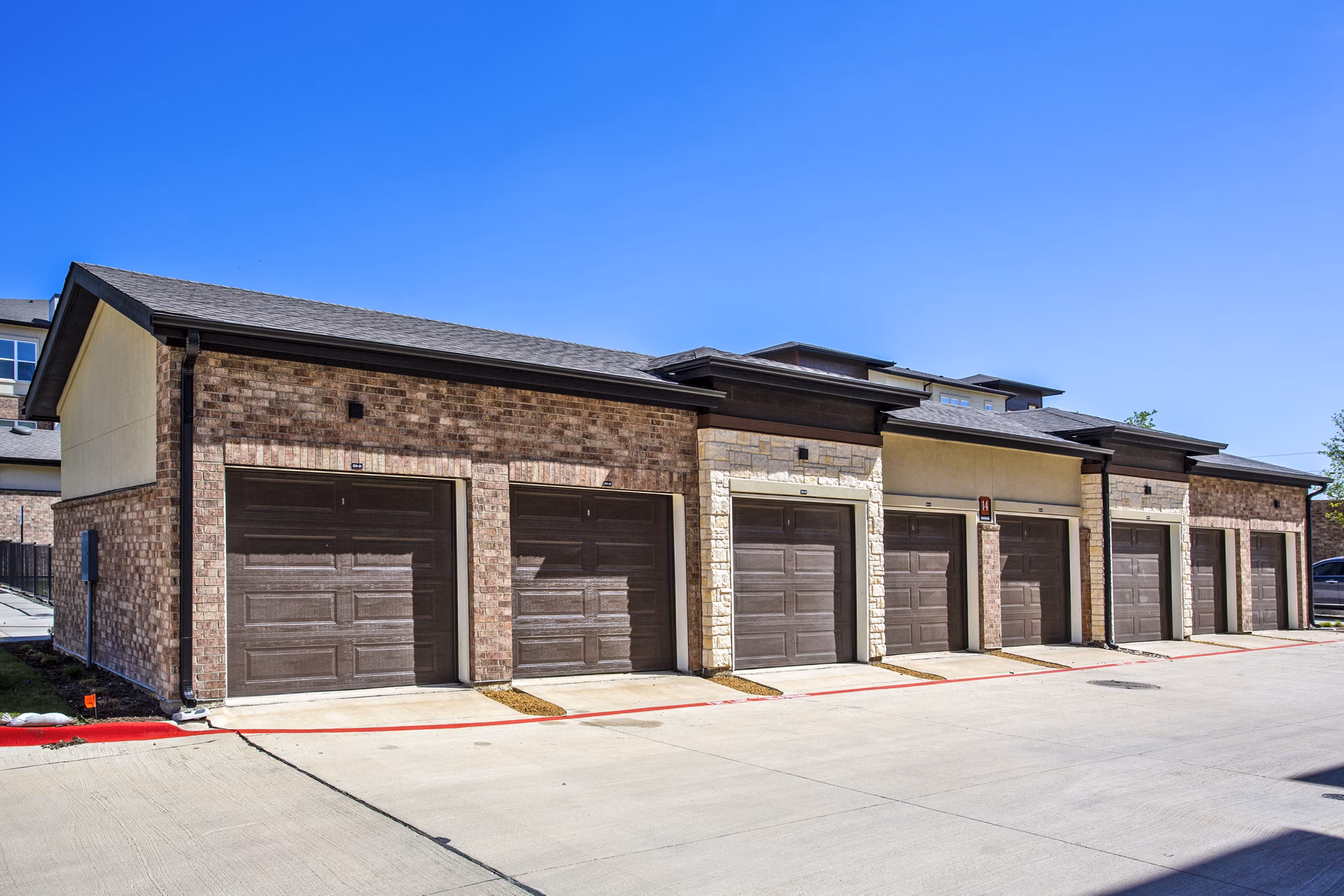 Covered parking facility at McKinney Terrace Apartments offering secure vehicle storage for residents