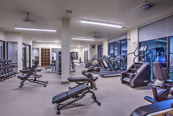 Modern fitness center with state-of-the-art equipment at McKinney Terrace Apartments, ideal for active lifestyles and wellness-focused residents
