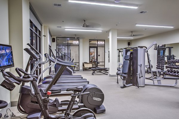 State-of-the-art fitness center with modern equipment at McKinney Terrace Apartments