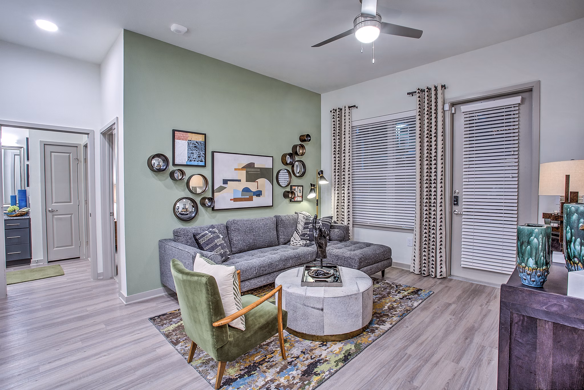 Spacious living room with modern furniture at McKinney Terrace Apartments