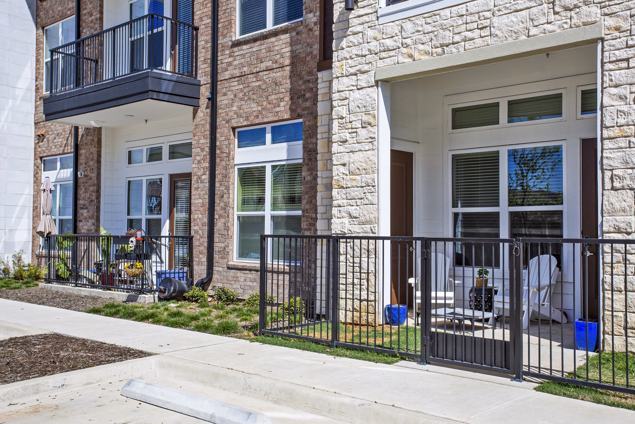 Modern patio with stylish outdoor seating at McKinney Terrace Apartments